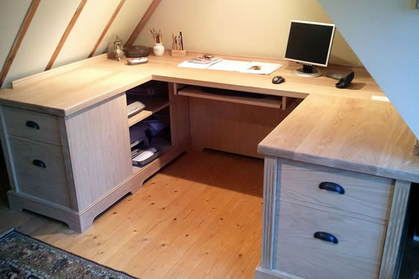 Oak desk fitted into eaves space