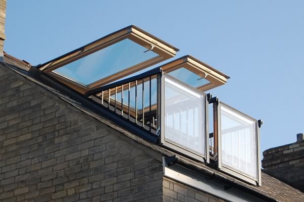 Balcony windows opening out from roof